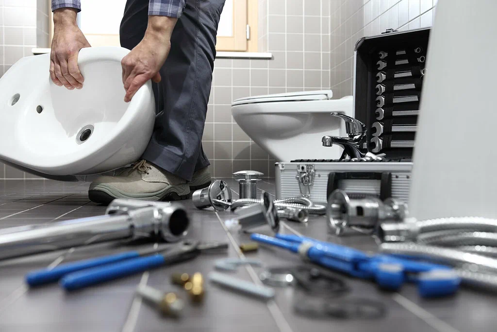 Plumbing tools prepared for a bathroom repair in Delray Beach